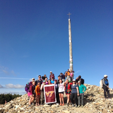 The group standing at the highest point of the Camino